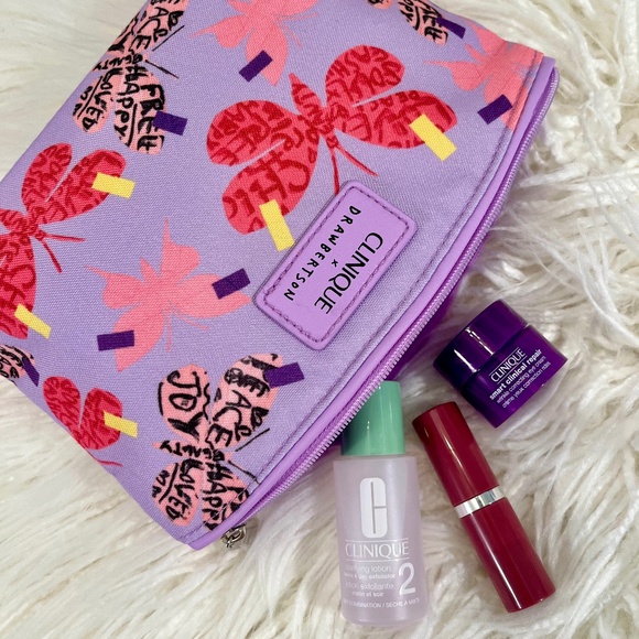 Clinique Other - Clinique "Cosmetic Bag in Butterflies with Goodies" NWT